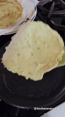 Flipping the Riced Broccoli Crepes.
