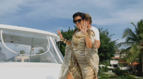 Kris and Bruce Jenner dancing on a yacht