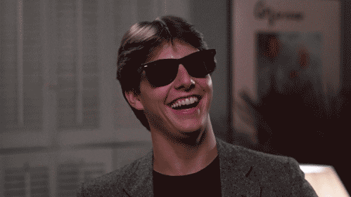 Happy Tom Cruise in sunglasses from the movie Risky Business