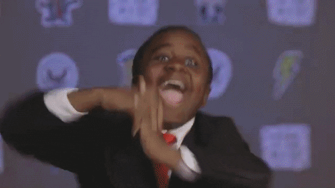 June 2021: Quarterly Glow Up Review - Gif of a child partying in a suit. 