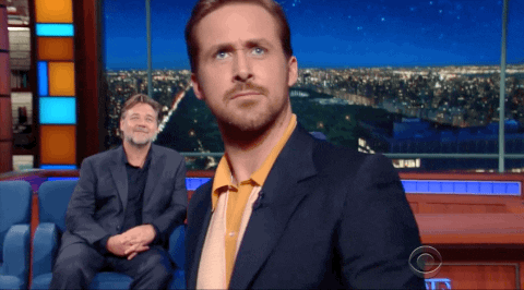 A gif with Ryan Gosling saying bye to the camera