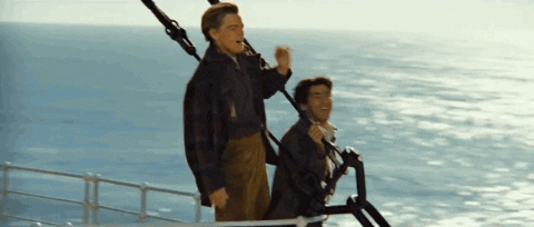 Leonardo DiCaprio as Jack Dawson in Titanic "King of the World" scene