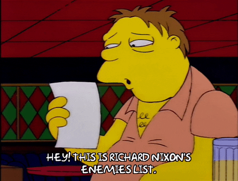 Barney from The Simpsons holds a paper with unreadable text on it and says, "Hey this is Richard Nixon's enemies list"