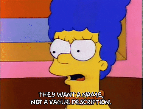 Marge Simpson talking with text saying 'They want a name, not a vague description'