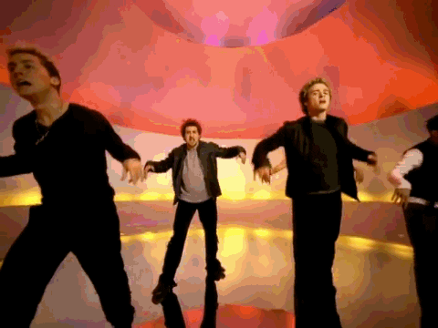 NSYNC singing and dancing, captioned "It's gonna be MAY."