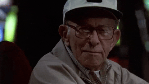 George Burns as God wearing ball cap and saying "Well?"