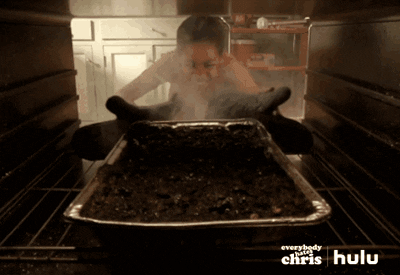 woman cooking on oven