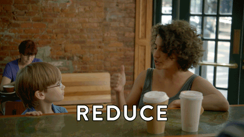 A gif of Ilana from Broad City speaking to a child while text overlay reads: 