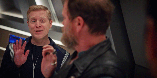 Lt. Stamets waves at another character. Lt. Stamets waves at another character.