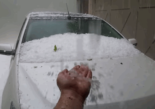 car being hit by hail gif