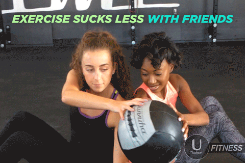 two girls exercising together