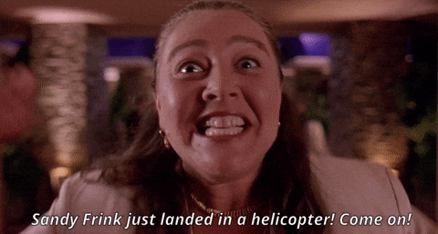 Romy shouting that Sandy Frink just landed in a helicopter