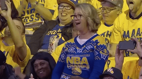 Golden State Warriors female fan dancing excitedly and badly