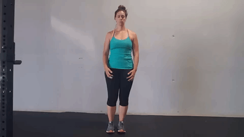 Modified/low impact jumping jacks - tap feet side to side, with overhead reach