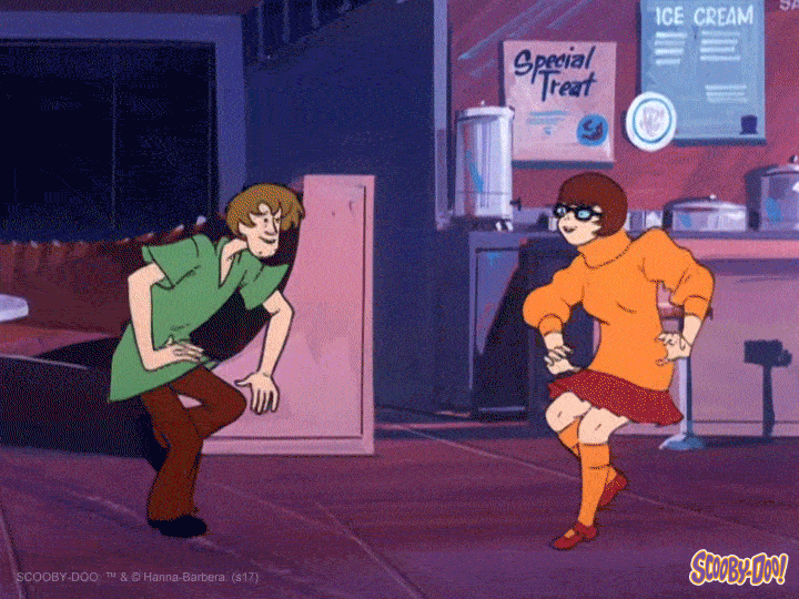 Velma and Shaggy from Scooby Doo boogying