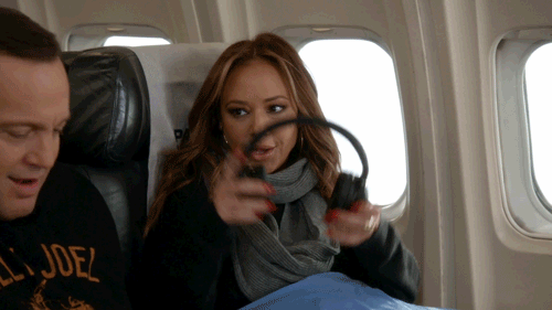 Image result for headphones on a plane gif