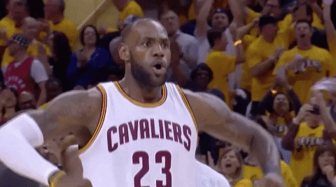Basketball player Lebron James yells in excitement