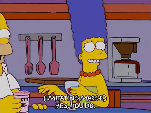 Homero y Marge tomando vino