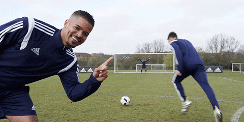A soccer player achieving a goal gif