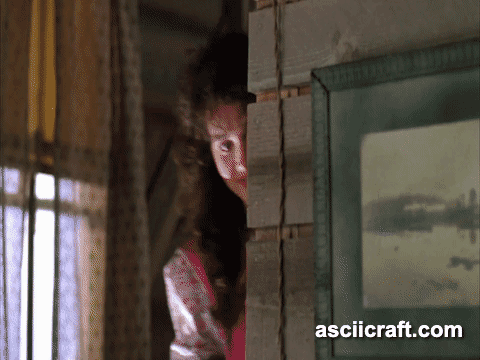 Michael Keaton as Betelgeuse with wild hair and mold-covered face, showcasing the film's handmade practical makeup from Tim Burton's 1988 classic