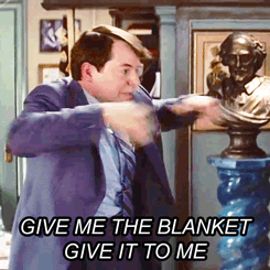 Matthew Broderick making hand gesture to hurry up and to give him the blanket