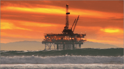 cinemagraph sunset oil rig