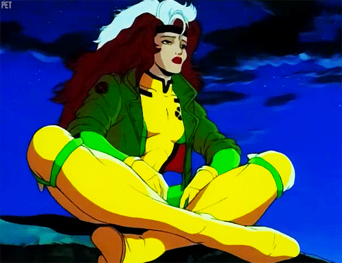 Rogue from X-Men cartoon sitting on ground