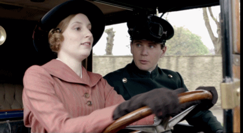 Edith learning to drive a car