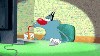 Oggy the cartoon cat relaxing on a couch watching TV