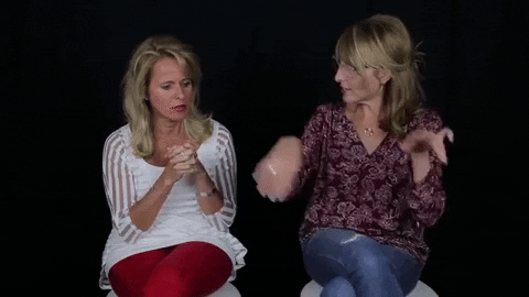 Gif of two women using their hands as they speak.