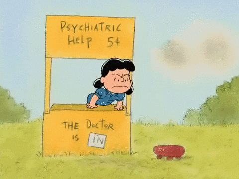Charlie Brown crawls to Lucy's psychiatric booth.
