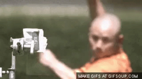 Monk throwing needle through glass gif