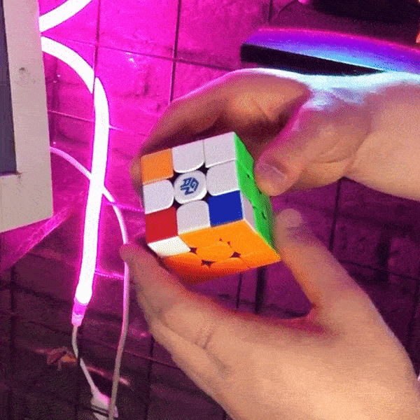 Looping animation of a Rubik's Cube being manipulated