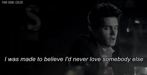 John Mayer performing in the dark. John Mayer performing in the dark.