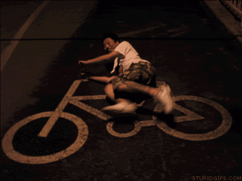 biking on bike lane sign