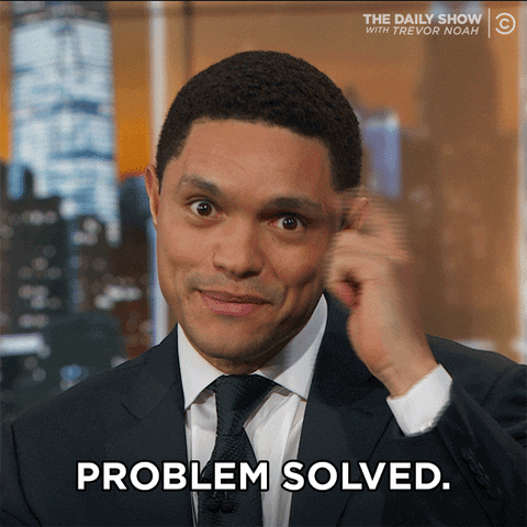 Trevor Noah pointing at his head and saying "Problem solved".