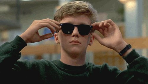 Gif animé : adolescent mettant des lunettes de soleil avec un air sûr de lui
