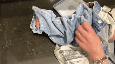Gif of a pair of jeans being turned inside out