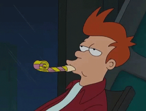 TV character Fry from cartoon show Futurama casually blows air through a New Year party prop
