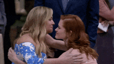 Two women giving an emotional hug