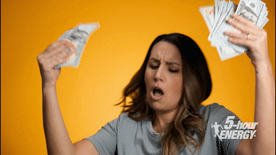 Gif of woman with fans of cash dancing around