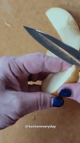 Peeling apples with a knife