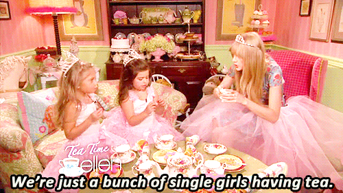A group of young girls sitting around a table at a Quinceanera brunch party