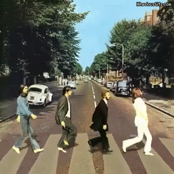 The Beatles walking on the street