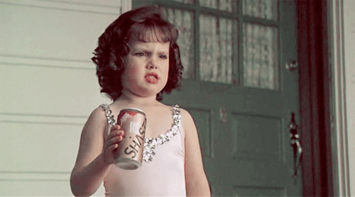 Darla from Little Rascals crushing a can 