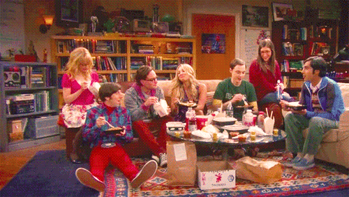 Gif of a scene from the TV show "Big Bang Theory" showing all cast members eating