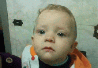 A funny GIF of an upset baby