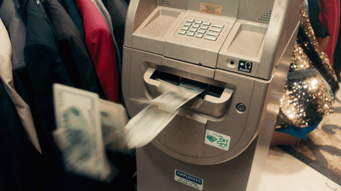 atm machine spitting out money