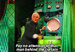 Wizard of Oz scene pulling back the curtain on the wizard