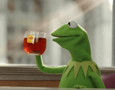 Kermit the Frog sipping tea while side-eyeing